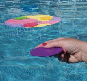 Plays like bocce ball in the water! 
Skim discs across the water surface and onto the floating target